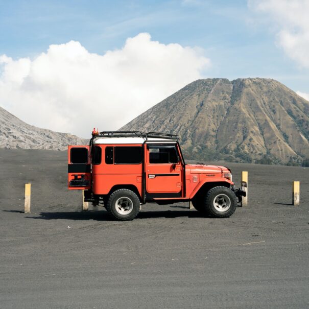 Red Jeep Park Near a Volcano
