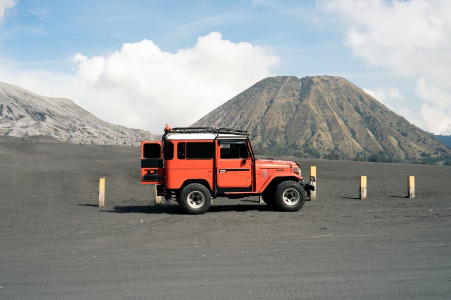 Red Jeep Park Near a Volcano